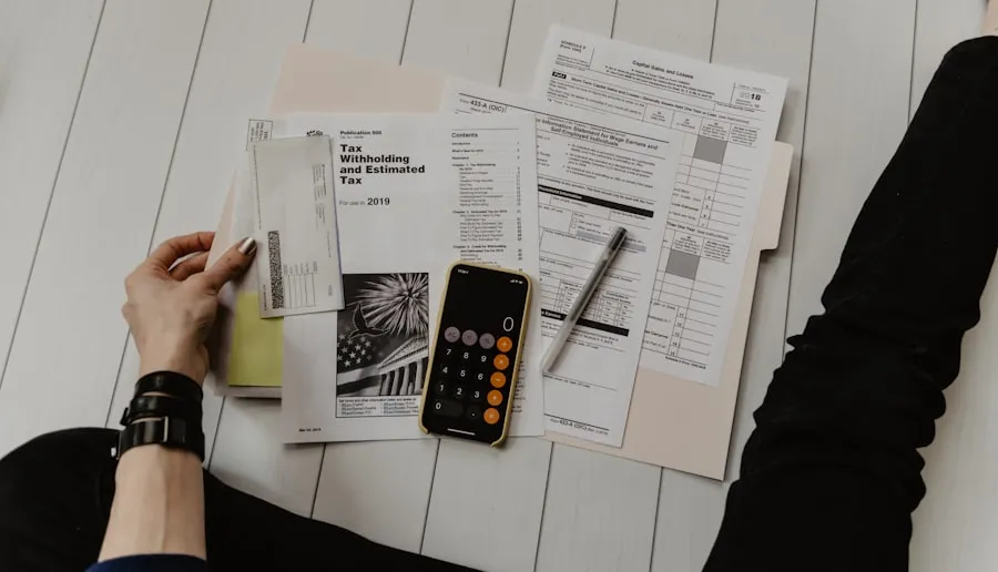 Person reviewing financial documents and calculations
